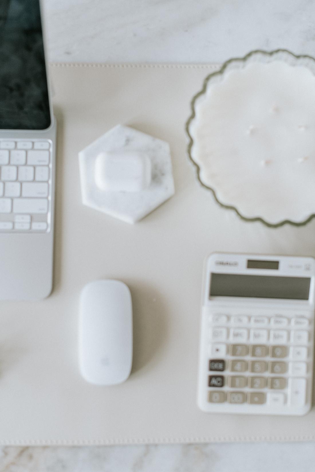 A calculator and laptop